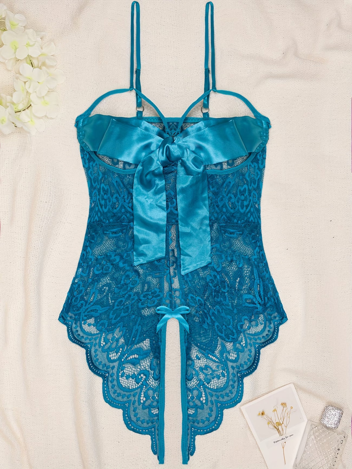 Body azul transparente com laços