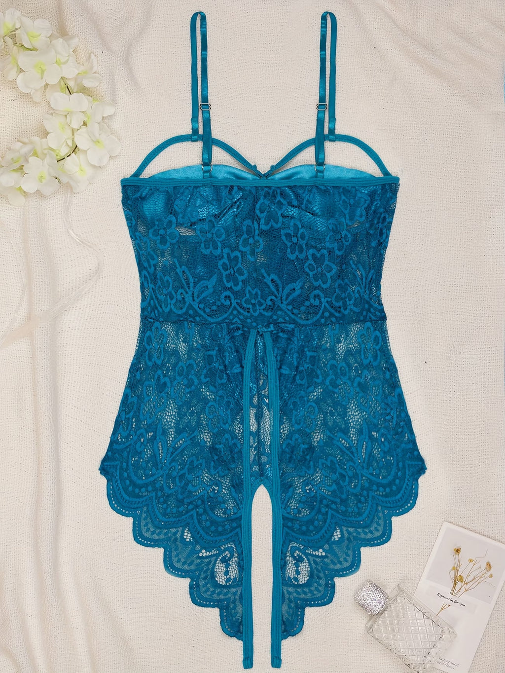 Body azul transparente com laços